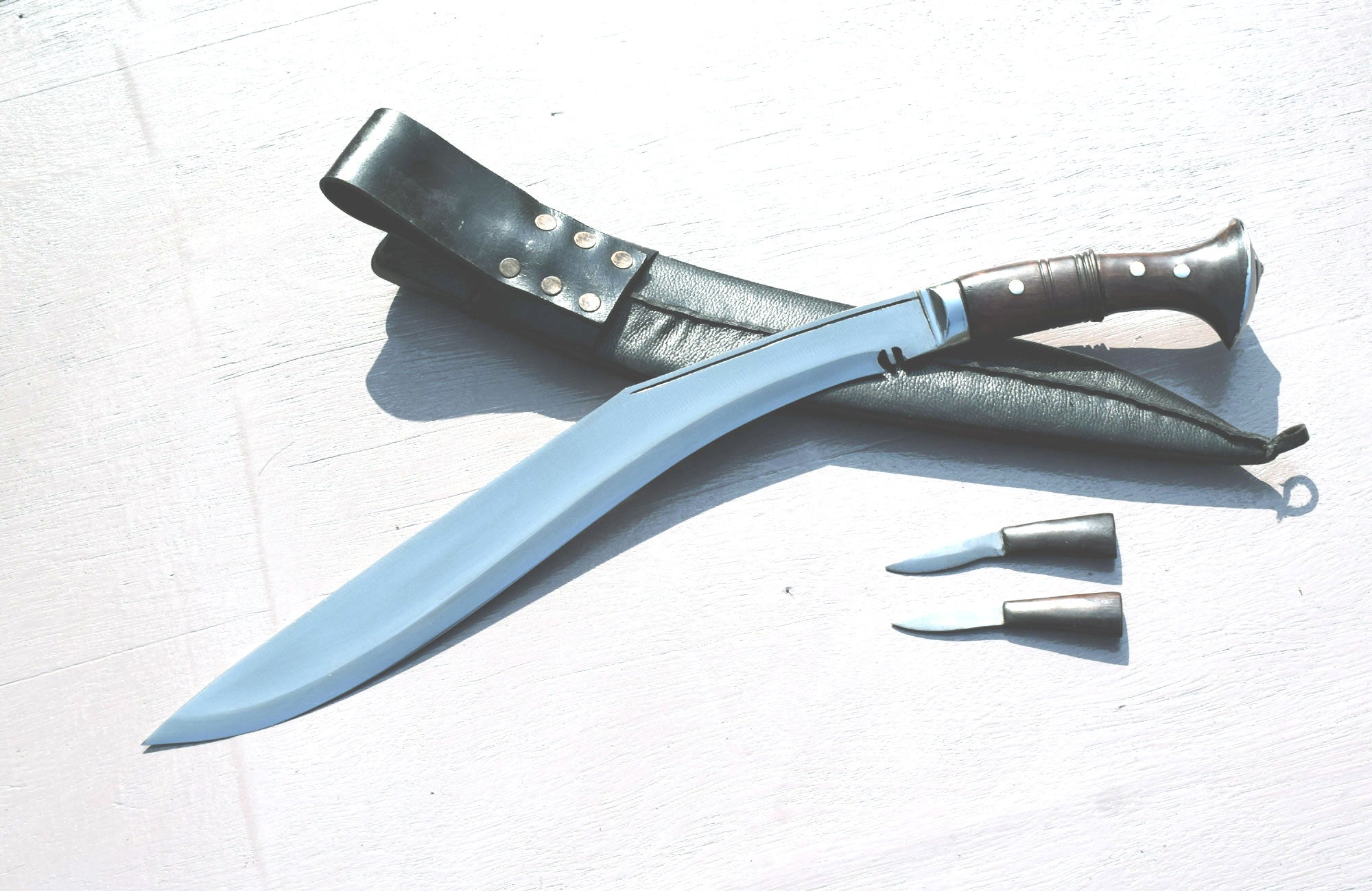 Grace Kukri House Sirupate full tang kukri knife top view with black cottonwood leather sheath