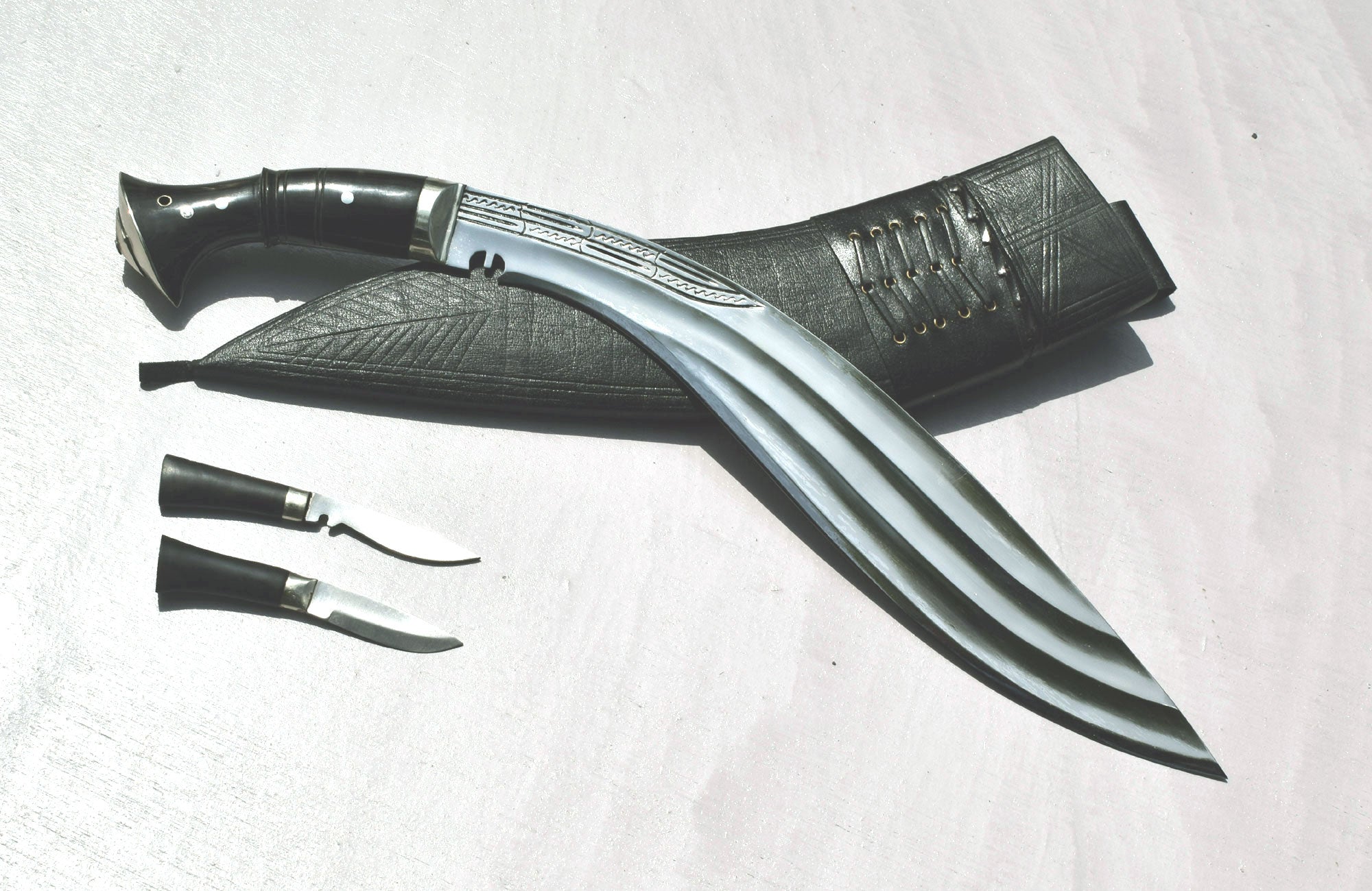 Traditional Nepalese military khukuri knife with black leather sheath