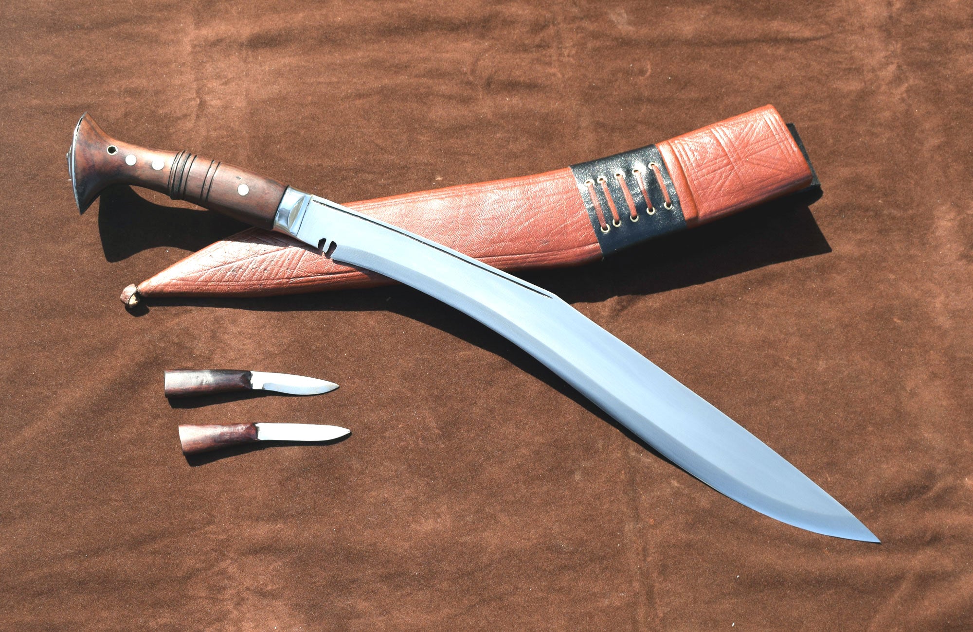 Sirupate Kukri full tang blade close-up with rosewood handle and brown leather sheath – Grace Kukri House