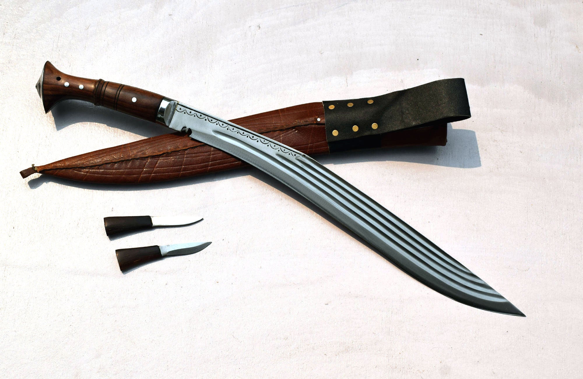 18 inch Sirupate Kukri full tang with rosewood handle, black leather sheath with brass rivets and Karda Chakmak – Grace Kukri House