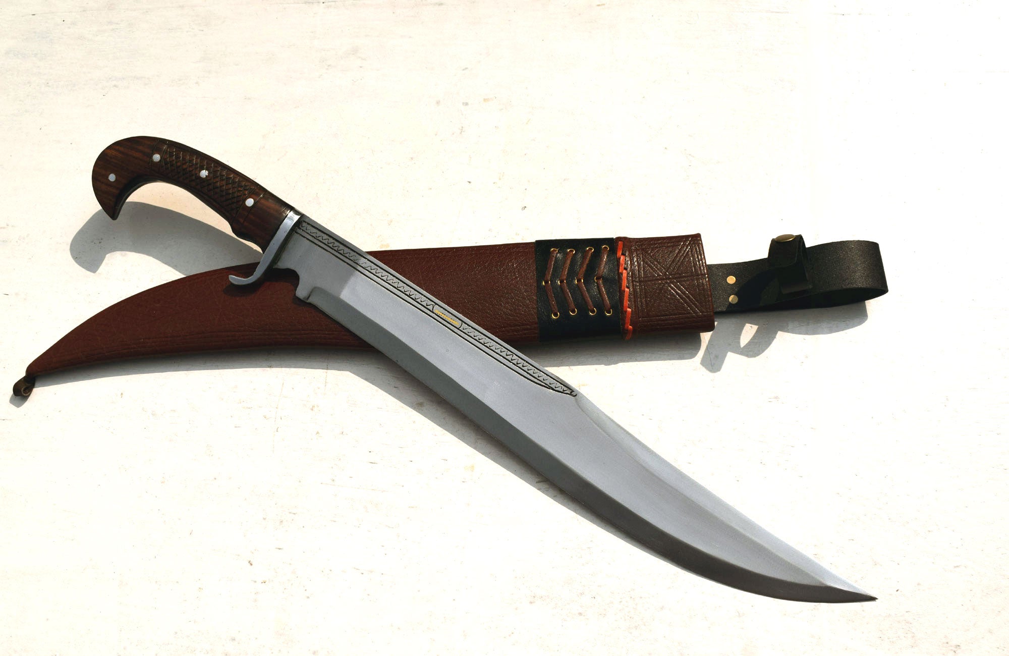 20 inch handmade Nepali kukri kopis machete with full tang rosewood handle and brown leather sheath – front view